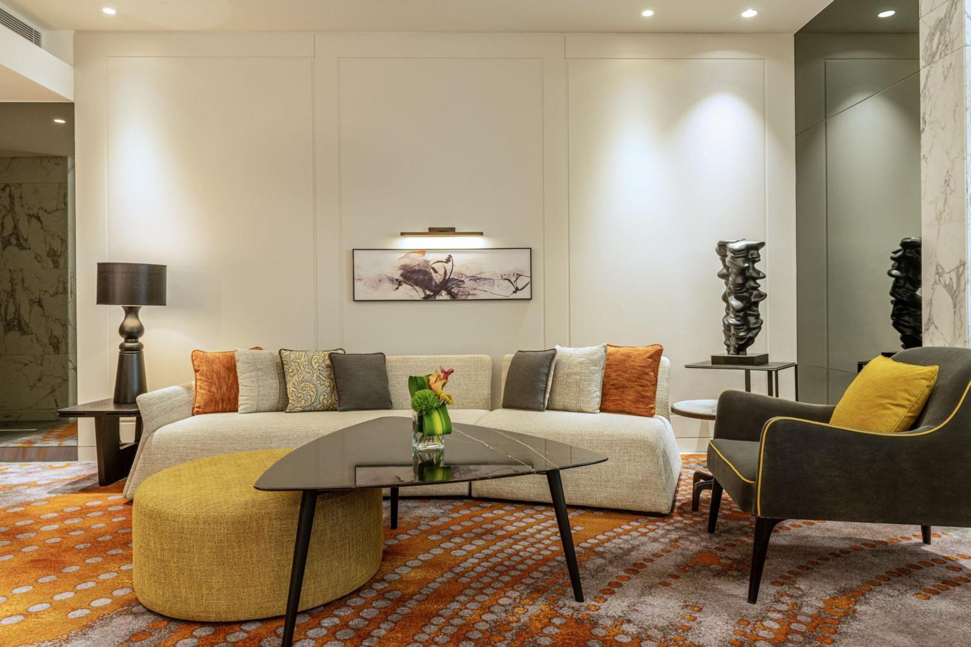 Le Royal Meridien Place Vendome Lusail Exterior photo A living room in a suite at the Mandarin Oriental, Jakarta